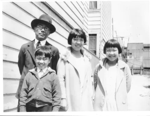 Director Numajiri with children