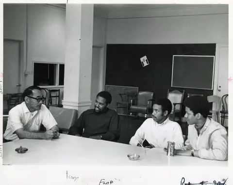 Yori Wada meets with staff