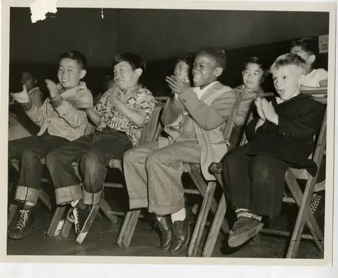Children applauding